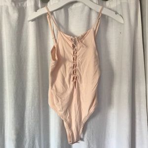 Peachy- nude bodysuit